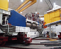 Detectors in Jefferson Labs Hall C help scientists gain new insight into the strong force. Shown are the short orbit spectrometer (right) and the high momentum spectrometer (left).