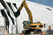 The excavator makes quick work of the fabric on Dome 226.