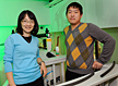 Mei Hong of the Ames Laboratory and Iowa State University, left, and Fanghao Hu of Iowa State used solid-state nuclear magnetic resonance spectroscopy to investigate the proton channel that connects a flu virus to a healthy cell.
