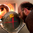 Steve Wender of the Los Alamos Neutron Science Center at Los Alamos National Laboratory examines the fission ion chamber used to measure the number of neutrons that pass through it to circuits and other electronic devices that undergo testing for potential failure due to cosmic ray bombardment. The LANSCE facility routinely hosts a steady stream of scientists working on critical research related to LANL's core mission as well as numerous industrial users. Consequently, LANL is planning to increase user capacity with an upgrade scheduled for completion in the summer of 2011.