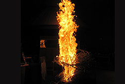 Wildfire fuel being burned in the fire laboratory as the aerosols from the top are being sucked into inlets and sampled at the Missoula Fire Sciences Laboratory in Missoula, Montana by Los Alamos and Carnegie Mellon University scientists.