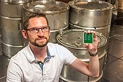 Jason Hamlet was on the Sandia National Laboratories team that developed SecuritySeal, a device that attaches to a container and detects tampering. The technology, which is based on physical unclonable functions, or PUFs, is available for licensing. “We are looking for commercialization partners,” Jason said. “We want this to be licensed and moved to the next level.” (Photo by Randy Montoya)