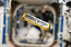 Photo by Astronaut Scott Kelly of a sample of the synthetic muscle experiment floating in the International Space Station.