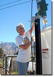 Carol Bruton, shown checking instrumentation, is one of the co-developers of the technology that filters out silica from geothermal waters.