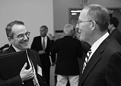 ORNL Deputy Director for Science & Technology Jim Roberto, who organized the National Science & Technology Summit, talks with Sen. Lamar Alexander, who championed the America COMPETES Act in Congress.