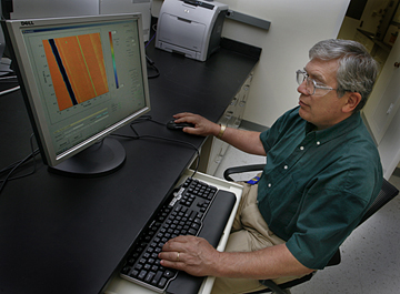 Jay Jellison scans data taken in the new Center for Applied Thin-Film Systems.