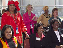 Black History Committee member Regina Parks stands behind the Make A Wish representatives (from left) Mamosa Foster, Marilyn Davidson and Brenda Reliford.