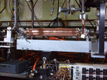 Two-foot long linear particle accelerator section