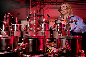 Barbara Kutchko uses a series of high-pressure vessels manufactured specifically for NETL's Geologic Sequestration Core Flow Laboratory.