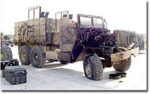 A gun truck, with an armor kit developed by Lawrence Livermore National Laboratory researchers and engineers, was struck by an improvised explosive device on March 23, 2005, southwest of Fallujah, Iraq. All seven U.S. soldiers in the vehicle at the time of the attack walked away unharmed.