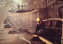 A conservationist works on Henry VIII's warship, the Mary Rose. (photo) The Mary Rose Trust