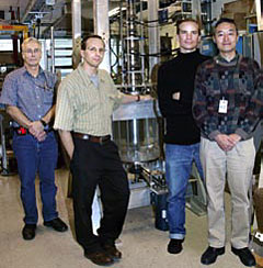 At the MRI experiment are, from the left, PPPL�s Bob Cutler, Michael Burin, Ethan Schartman, and Hantao Ji.