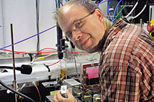 SSRL beamline scientist Sam Webb prepares to place a sample into the new hard x-ray microprobe.