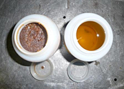 INL technology helps produce high quality biodiesel (right) from oils contained in municipal waste water, restaurant grease traps and other sources (left).