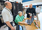 Charles Gentile (center), and other members of the MINDS team, including Ken Silber (right) and Bill Davis (left) work on new techniques to identify radionuclides.