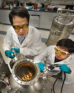 Brookhaven physicists Weidong Si (left) and Qiang Li.