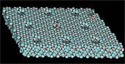 A computer graphic showing a fructose molecule (white, gray and red chain-like structure) within a zirconium oxide nanobowl (at center). Other nanobowls in the array are unoccupied. The red atoms are surface oxygen and the blue atoms are zirconium. Click on the image to view a larger version. Larry Curtiss, Argonne National Laboratory.