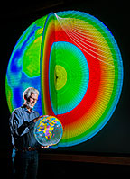 Sandia Labs researcher Sandy Ballard and colleagues from Sandia and Los Alamos National Laboratory have developed SALSA3D, a 3-D model of the Earth’s mantle and crust designed to help pinpoint the location of all types of explosions. (Photo by Randy Montoya)