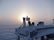 A multifilter rotating shawdowband radiometer (MFRSR) measures direct and diffuse sunlight in Barrow, Alaska. Now that PNNL scientists have a new method for screening out the thin clouds prevalent at this site, MFRSR measurements of aerosol particles will be much more accurate. Photo courtesy of the ARM Climate Research Facility.