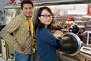 Scientists Aditya Mohite, left, and Wanyi Nie are perfecting a crystal production technique to improve perovskite crystal production for solar cells at Los Alamos National Laboratory.