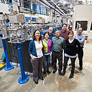 Members of the Intermediate Energy X-ray collaborative development team standing in front of the beamline. Left to right: Jessica McChesney, Yizhi Fang, Tim Roberts, Mohan Ramanathan, Mike Fisher, Fanny Rodolakis, and Ruben Reininger.