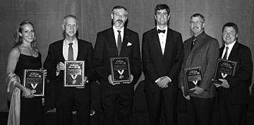 Present at Awards Night to receive the team award were (bottom, from left) Elisabeth Walker, Raymond Vedder, Robert Jubin, Lab Director Thom Mason, Dave Caquelin and Gary Bell.