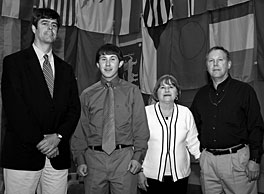 UT-Battelle Scholarship winner Jeremy Buckles is flanked by ORNL Director Thom Mason (left) and his parents, Betty and Keith Buckles of Lenoir City. Jeremy will attend the University of Tennessee with the help of the four-year scholarship.