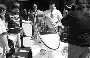ELECTRIC RIDE  Students from the Oak Ridge ARC  brought an  electric vehicle they designed to ORNL’s Earth Day celebration on April 16. The event featured ecology demonstrations, an alternative vehicle show and a swap of plastic grocery bags for reusable containers.