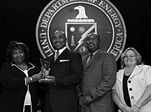 From left: Brenda DeGraffenreid, DOE Office of Small and Disadvantaged Business Utilization; Keith Joy, director of Small Business Programs; Jerome Hicks, Contracts Division director; and Marsha Daigle, U.S. Small Business Administration.