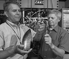 Phil Maziasz (left) and Bob Swindeman with a sample of CF8C-Plus, which won an R&D100 Award in 2003 and a Federal Laboratory Consortium national award last year.