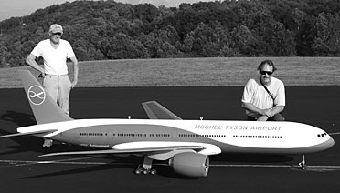  Gene Waters and his son display a 1/16-scale Boeing 777 they built for the McGhee Tyson Airport Authority.
