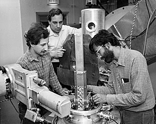 (From left) Ed Uberbacher, Gerry Bunick and Venkatraman Ramakrishnan prepare a neutron scattering experiment in 1983.