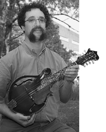 Larry Anovitz and the mandolin he made, which involved quite a bit of science.
