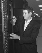 Sen. Bill Frist signs his name to ORNLs Cray X1 supercomputer.