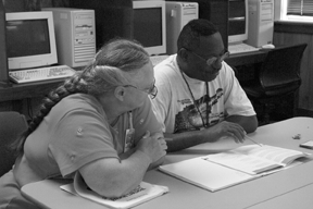 Thelma Morgan, SEP instructor, Roane State Community College, works with Robert Henry of Records, Tranining and SBMS Division and an SEP participant.