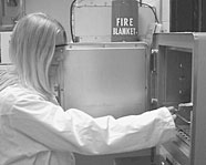 Kelsye Roark prepares her Coalfield High air samples for her science fair project.