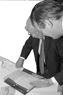 Former Sen. Howard Baker (left) and Jeff Wadsworth peruse the Graphite Reactors historic
logbook.