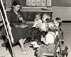 In this newspaper photo from 1959, Nancy Markham, the child nearest the camera, is shown taking part in a class at the University of Tennessees Hearing and Speech Center. 