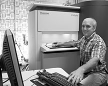 Harry Meyer runs tests on the newly installed X-ray photoelectron spectrometer at the High Temperature Materials Laboratory.